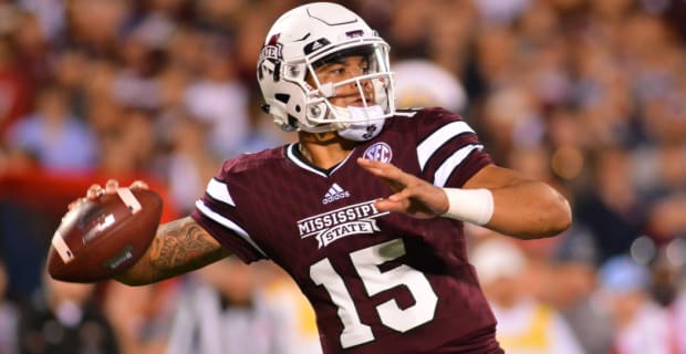 Mississippi State Bulldogs quarterback Dak Prescott attempts a pass during a college football game in the SEC.